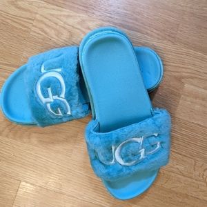 Ugg slip-on slippers.
